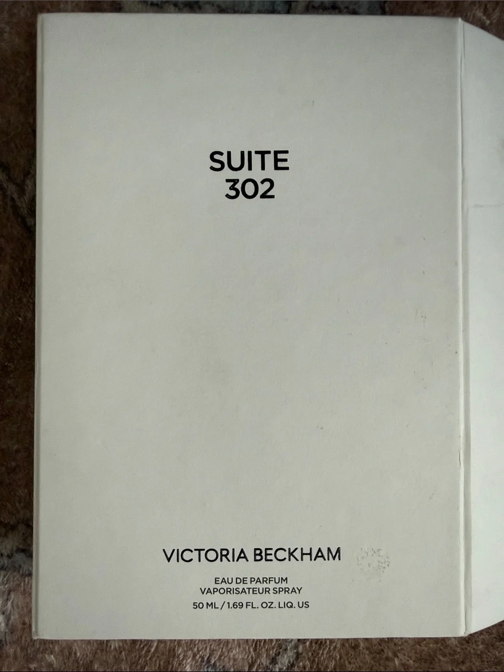 Victoria Beckham White and Gold Suite 302 Fragrance Bottle